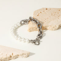 Fashionable pearl and stainless steel two chain bracelet